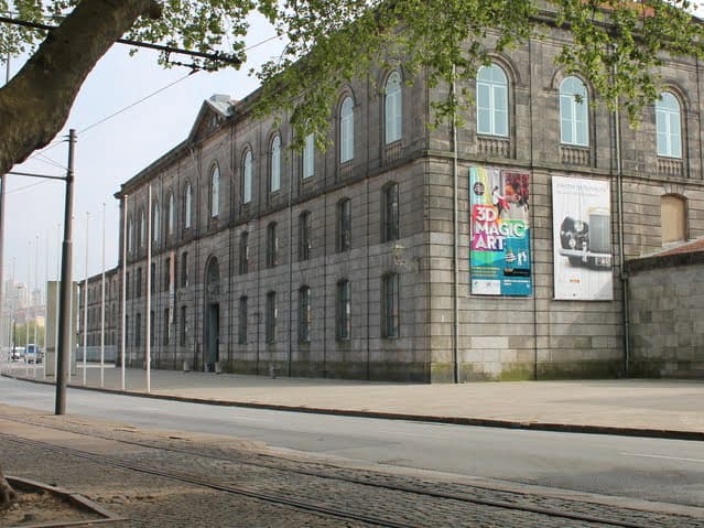 Historic riverside architecture along the Camino route near Porto